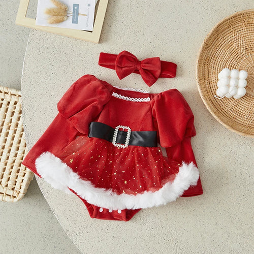 Barboteuse de Noël bébé Aria, gros plan ceinture noire et boucle perlée