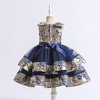 Elegante vestido de gala para niñas con un lazo en los hombros.