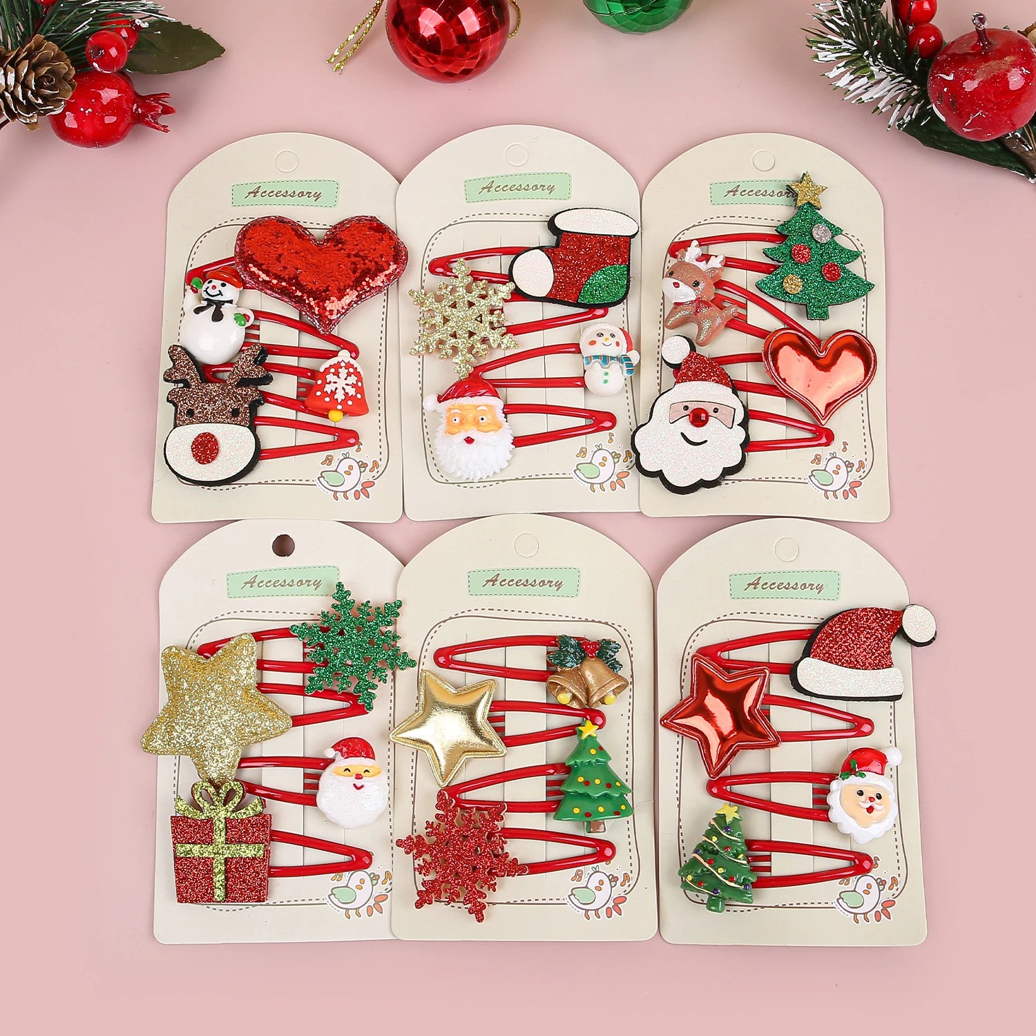 Set di 4 fermagli per capelli natalizi