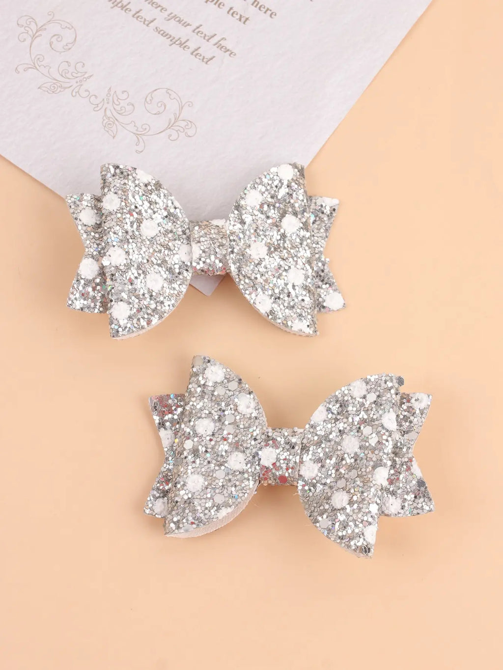 Lot de 2 pinces cheveux nœud papillon enfant argenté