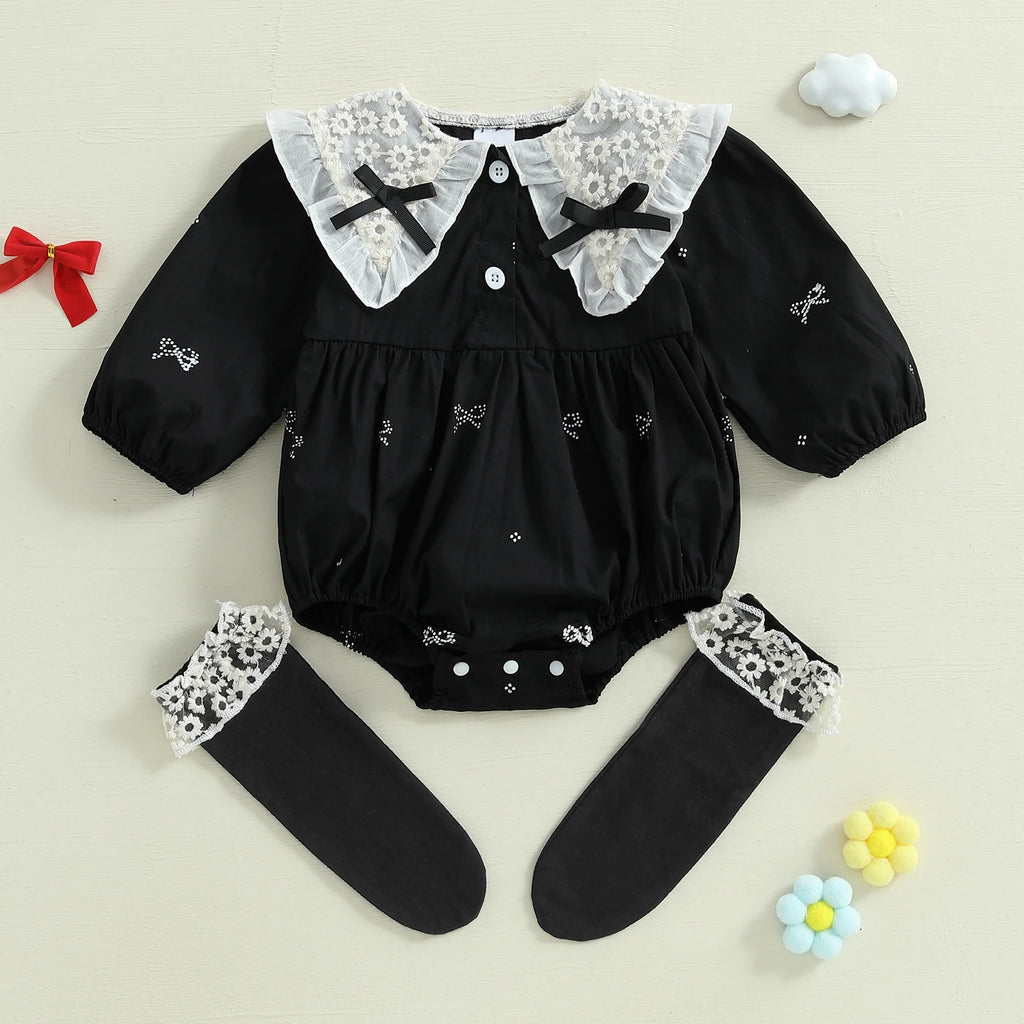 Conjunto infantil de dos piezas, blanco y negro.