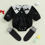 Conjunto infantil de dos piezas, blanco y negro.