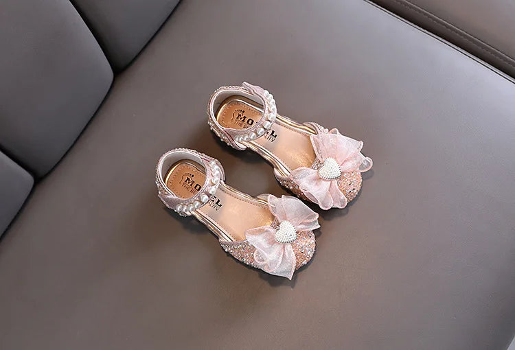 Sandali da bambina con fiocco e cuore