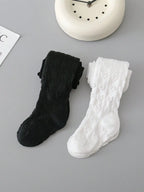 2 pares de medias blancas y negras