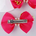 Pinzas rosas para el cabello de niñas