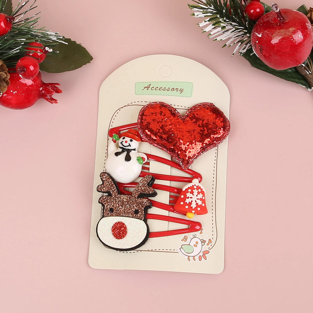 Juego de 4 pinzas para el cabello navideñas