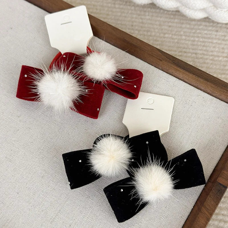 pinzas para el cabello o coleteros con pompones