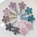 Barrette dorée fleur pailletée pour cheveux de fille