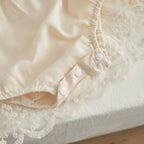 Bas barboteuse bébé avec finition dentelle