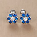 Boucles d'oreilles pour enfant en acier inoxydable avec cristaux bleu saphir taillés en pétales de fleur