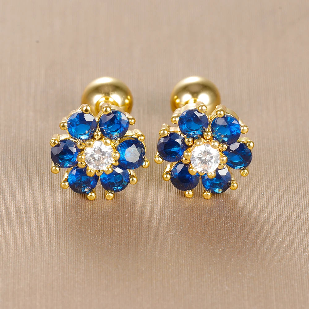Bijoux enfant dorés : boucles d'oreilles fleurs en acier inoxydable avec cristaux bleu saphir et monture couleur or