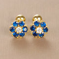 Bijoux enfant dorés : boucles d'oreilles fleurs en acier inoxydable avec cristaux bleu saphir et monture couleur or