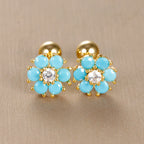 Petites boucles d'oreilles fleurs dorées pour fille avec cristaux bleu turquoise et tige en acier doré