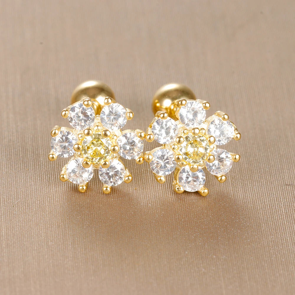 Boucles d'oreilles fleurs couleur or avec cristaux blancs transparents pour une élégance classique