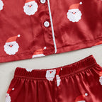 boutons et ceinture élastique du pyjama de noël rouge pour fille ou bébé