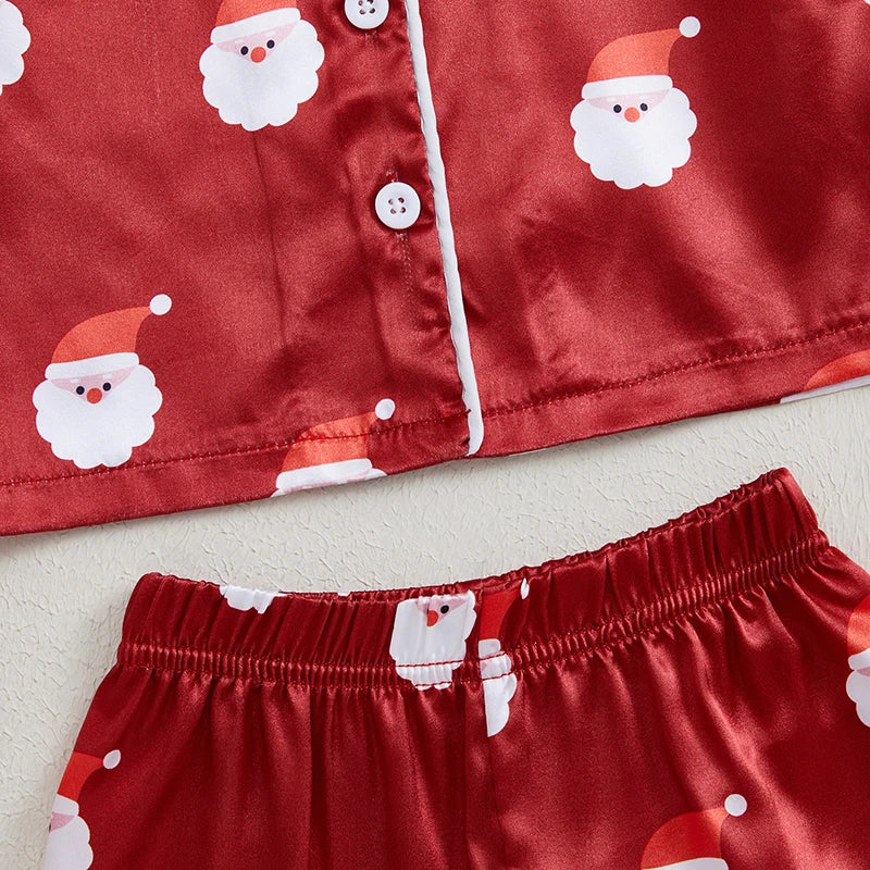 boutons et ceinture élastique du pyjama de noël rouge pour fille ou bébé