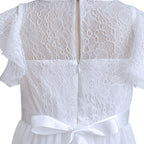 Détail du dos de la robe avec fermeture éclair invisible et nœud de satin.