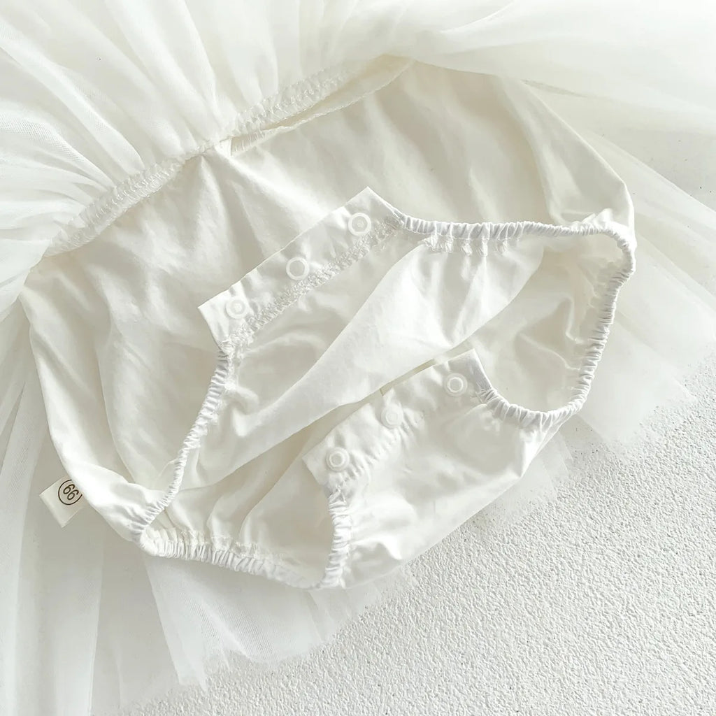 Détail de la doublure en coton de la barboteuse pour garantir le confort de la peau de bébé