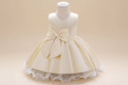 Robe anniversaire fille champagne satinée élégante