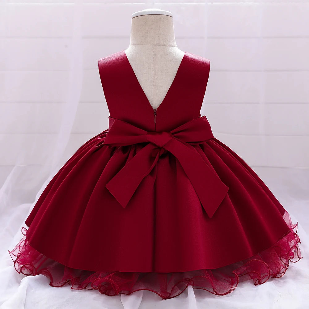 Dos robe anniversaire fille satinée avec nœud