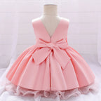 Robe anniversaire fille rose satinée avec nœud élégant