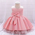 Robe anniversaire fille rose avec jupe volumineuse