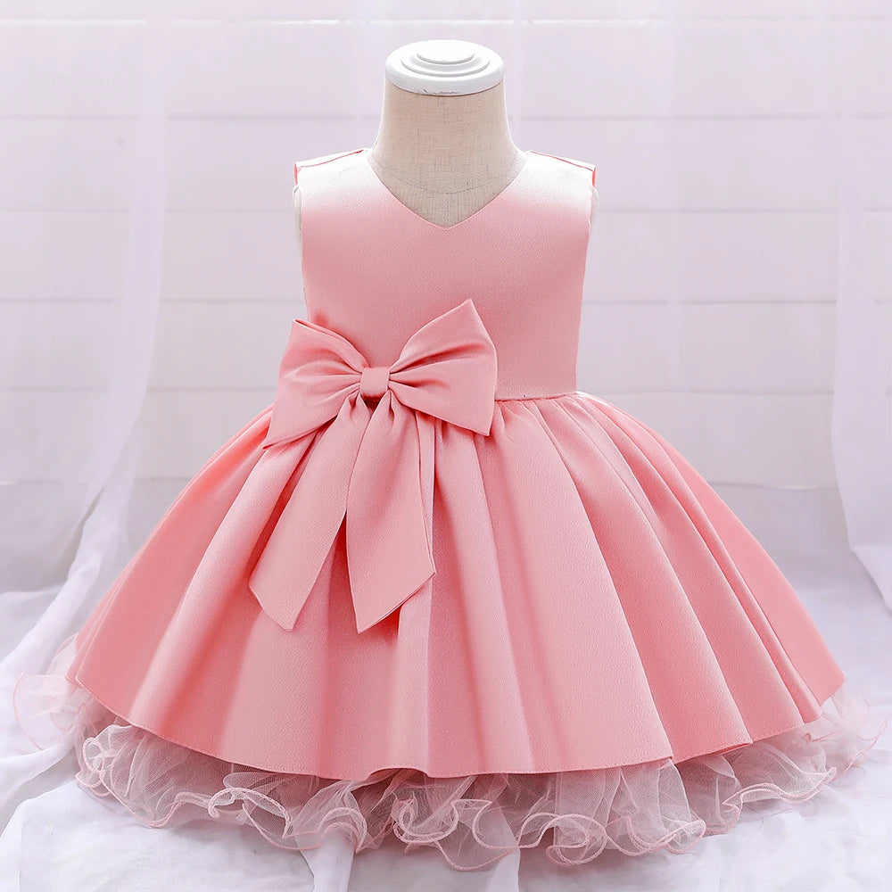 Robe anniversaire fille rose avec jupe volumineuse
