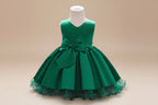 Robe anniversaire fille verte satinée avec jupe volumineuse