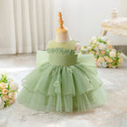 Robe de cérémonie bébé couleur vert d'eau style princesse en tulle.