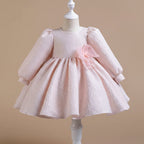 Robe cérémonie fille rose avec jupe ample et tissu texturé élégant