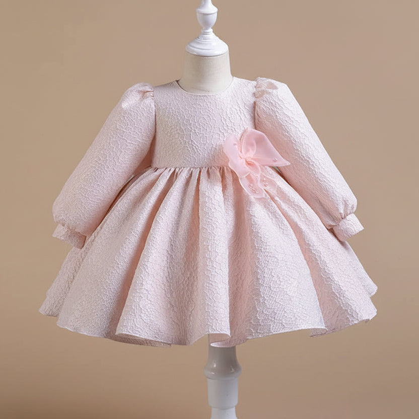 Robe cérémonie fille rose avec jupe ample et tissu texturé élégant