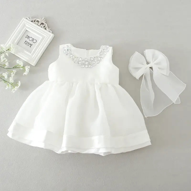Robe blanche satin bébé fille
