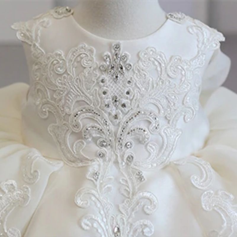 bustier motifs dentelle robe cérémonie bébé blanc crème
