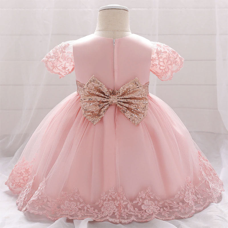 robe de mariage bébé fille rose au noeud papillon pailleté et dorée