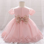 robe de mariage bébé fille rose au noeud papillon pailleté et dorée