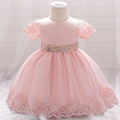 robe de mariée bébé fille rose et manches courtes