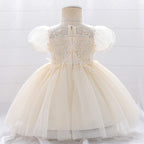 Robe baptême champagne petite fille