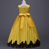 robe de bal fille jaune vue de dos